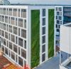 Foto: Helix. - Beim neuen Innovation Center in Stuttgart wurde ein Teil der Ostfassade begrünt: zwei Streifen mit einer Breite von je 3,60 Metern und einer Höhe von über 20 Metern. 